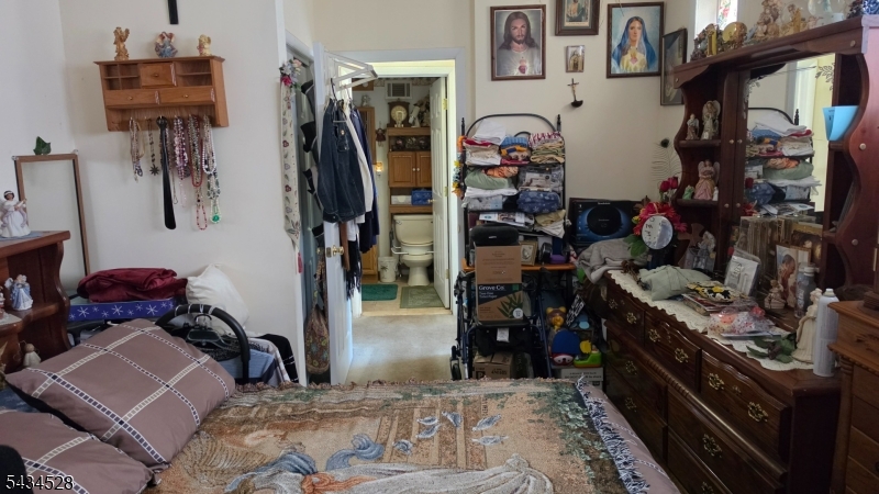 1115 West Camplain Road Manville, NJ 08835 - Photo 5 of 18 a view of walk in closet