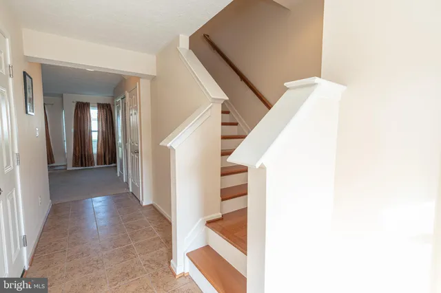 a view of a hallway with staircase