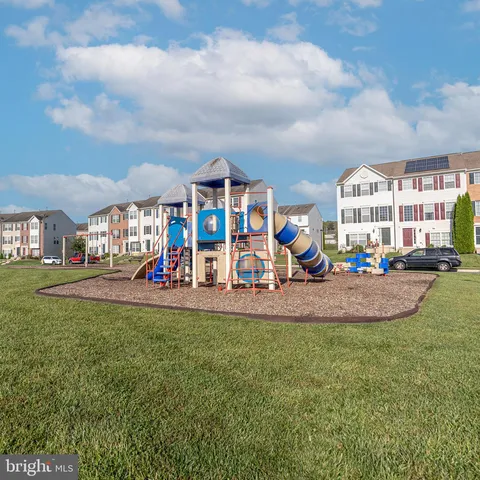 a front view of building with outdoor space