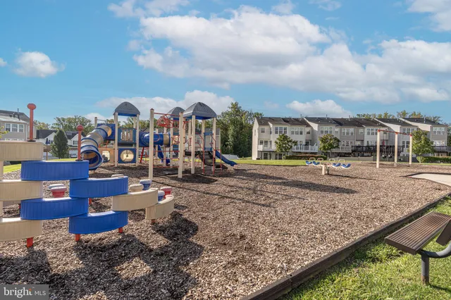 a view of a town with large trees