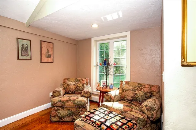 a view of a hallway with stairs