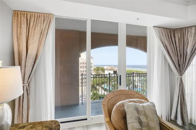a kitchen with granite countertop cabinets stainless steel appliances and a counter space