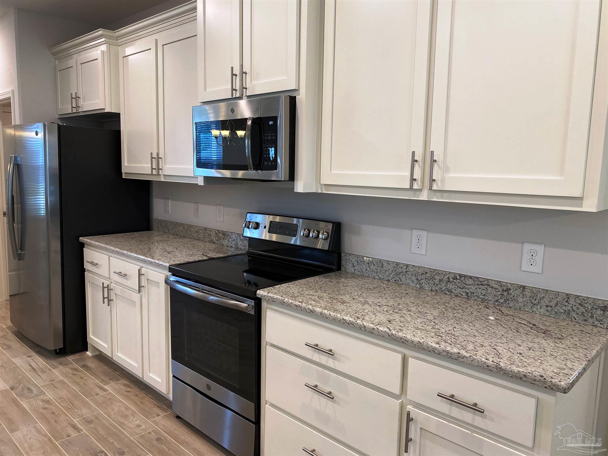 5496 South A Jones Road Milton, FL 32583 - Photo 11 of 26 The kitchen is designed to please any chef.