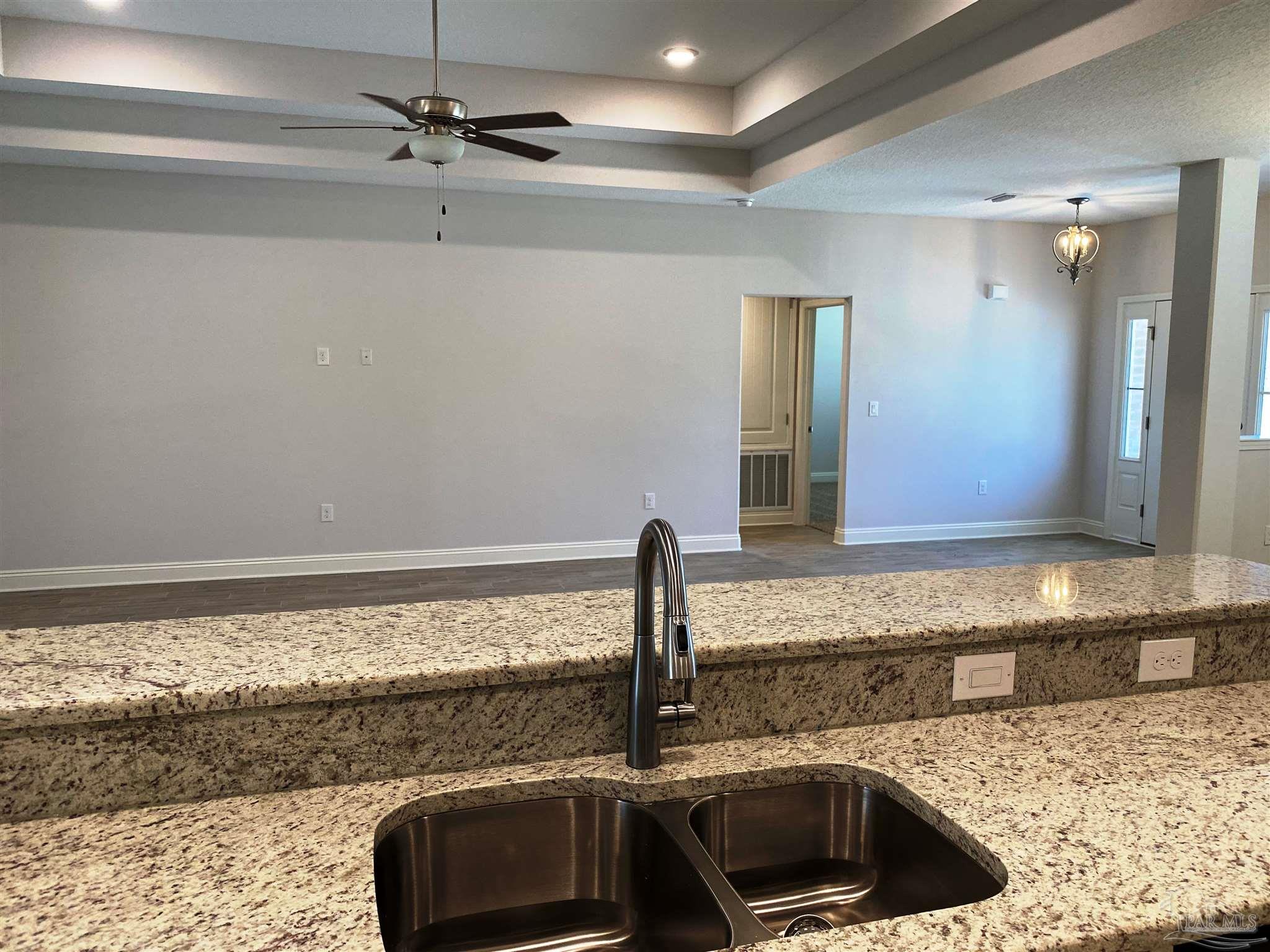 5496 South A Jones Road Milton, FL 32583 - Photo 12 of 26 Bar provides additional seating area for meals.