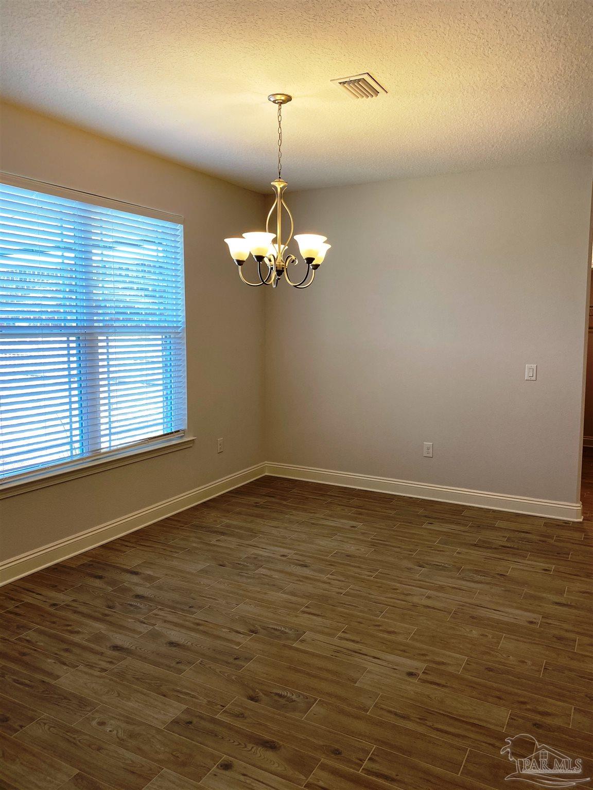 5496 South A Jones Road Milton, FL 32583 - Photo 3 of 26 Serve special meals in the formal dining room.