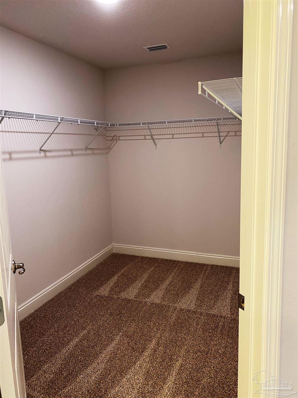 5496 South A Jones Road Milton, FL 32583 - Photo 22 of 26 Large master bath closet has room to share.