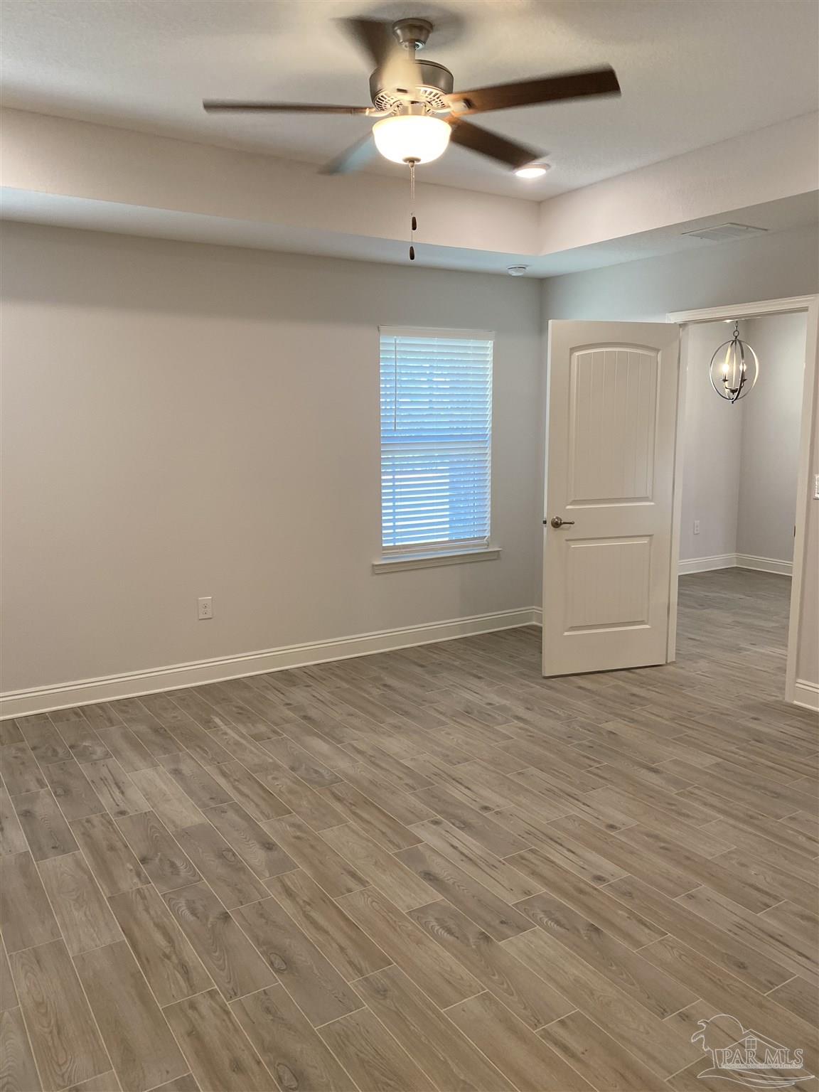 5496 South A Jones Road Milton, FL 32583 - Photo 23 of 26 A view within master toward its entry/exit.