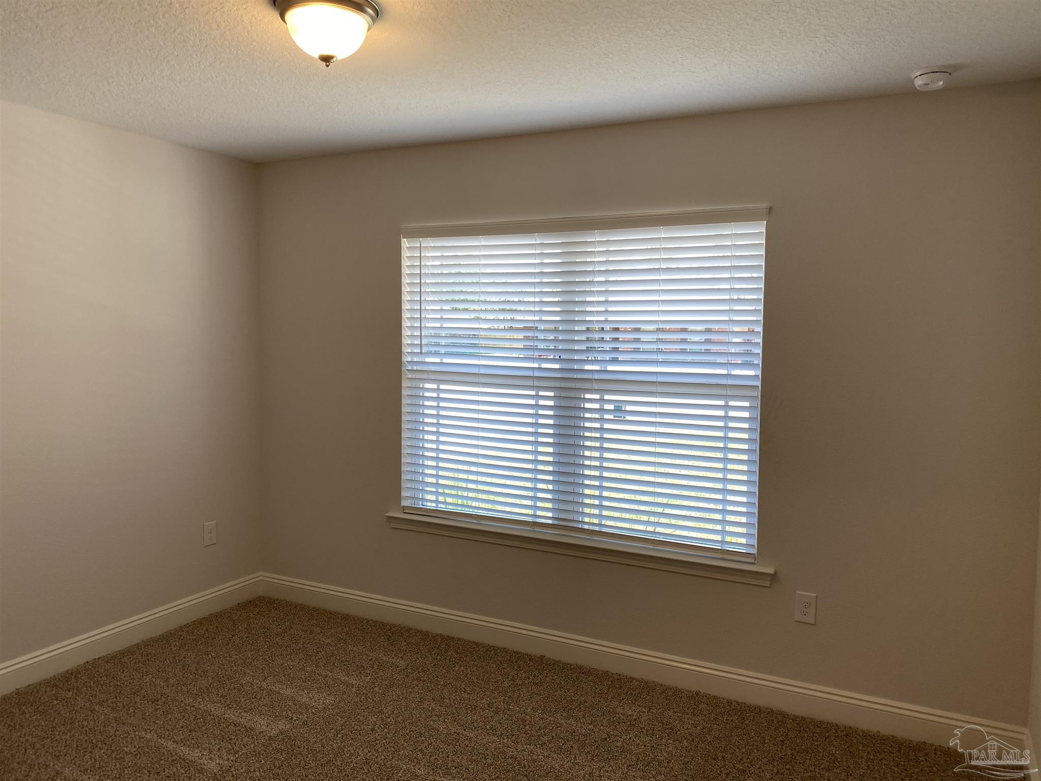 5496 South A Jones Road Milton, FL 32583 - Photo 4 of 26 Here's a view of the 2nd bedroom.