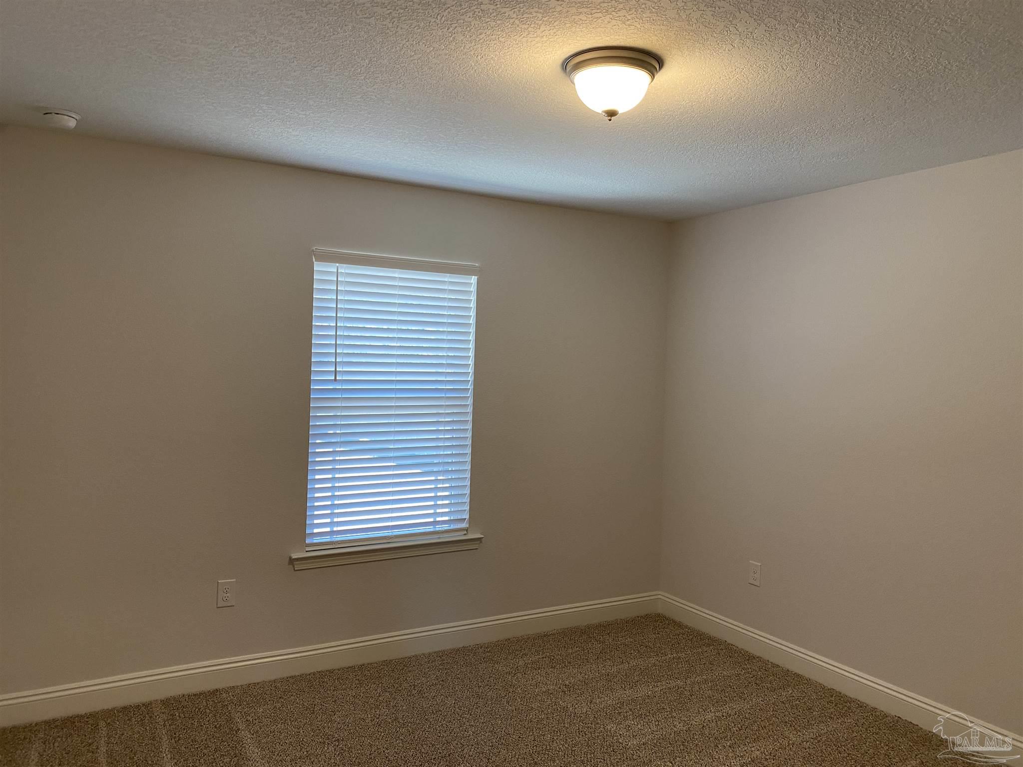 5496 South A Jones Road Milton, FL 32583 - Photo 7 of 26 A view of the 3rd bedroom is shown here.