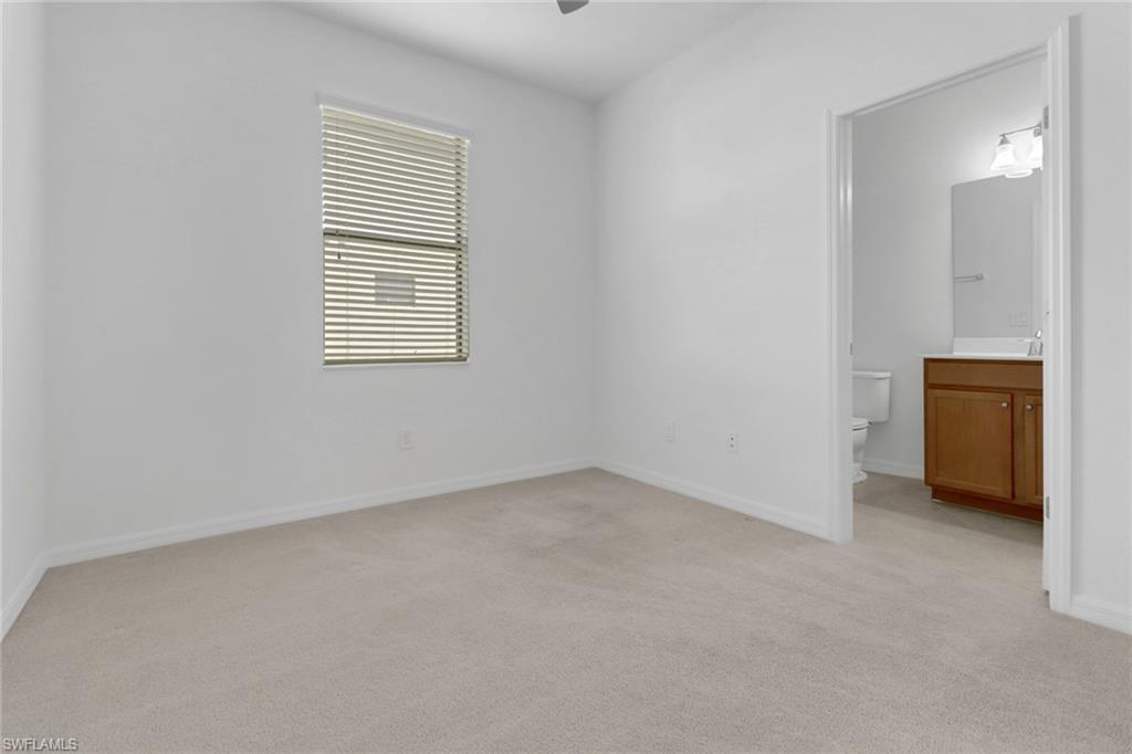 13527 San Georgio Drive Estero, FL 33928 - Photo 15 of 49 an empty room with a window