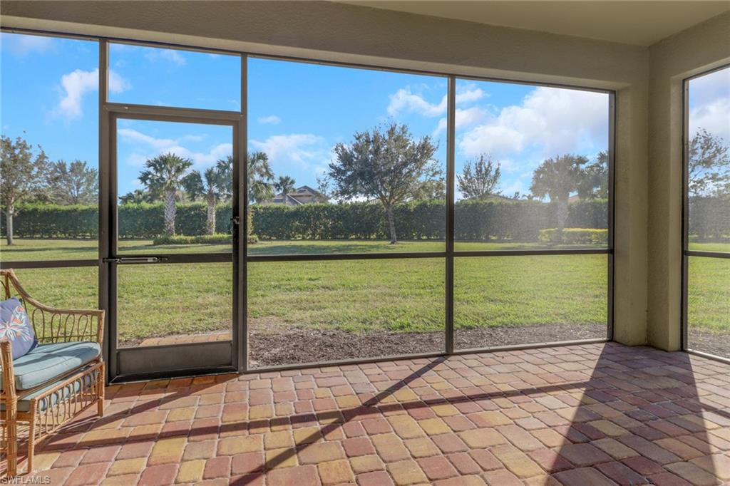 13527 San Georgio Drive Estero, FL 33928 - Photo 22 of 49 a view of a garden from a balcony