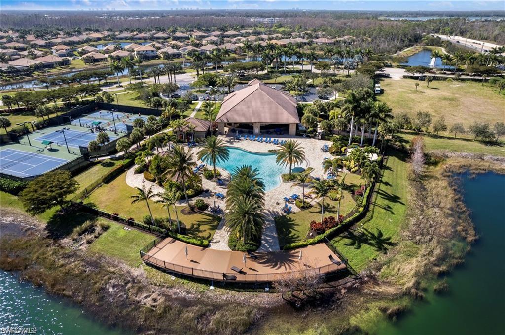 13527 San Georgio Drive Estero, FL 33928 - Photo 26 of 49 an aerial view of residential houses with outdoor space