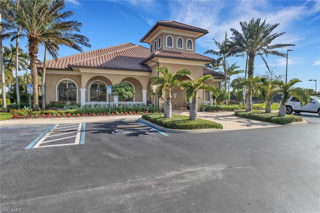 13527 San Georgio Drive Estero, FL 33928 - Photo 27 of 49 a view of multiple houses with a yard