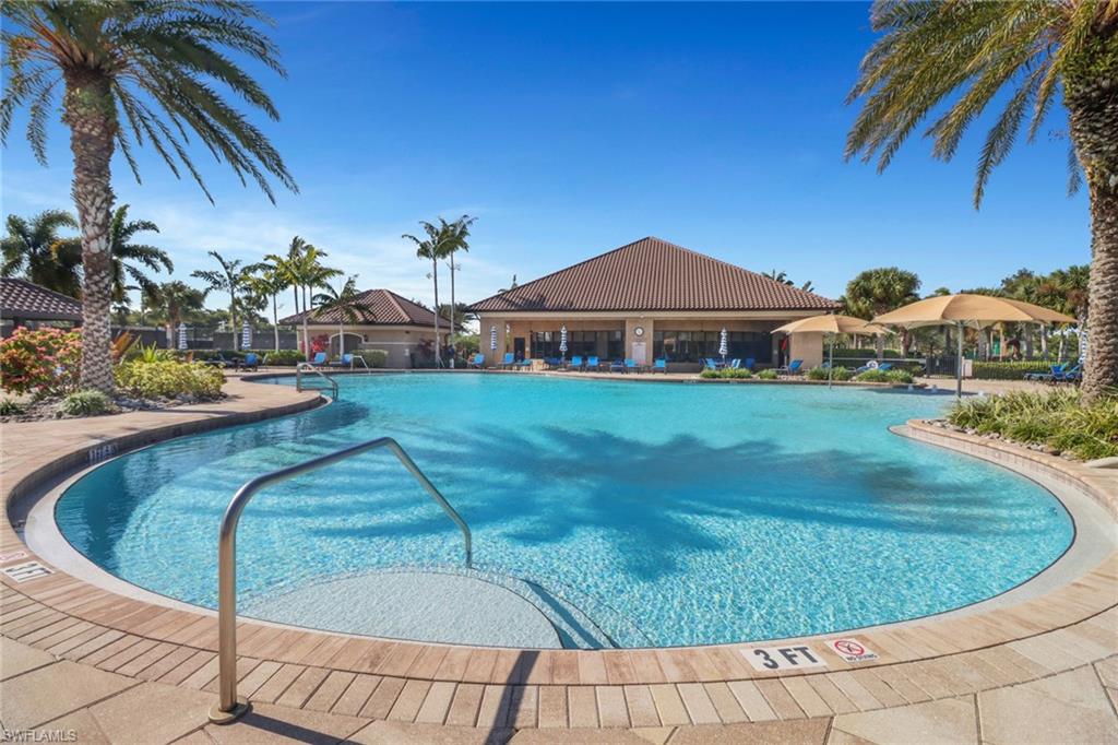 13527 San Georgio Drive Estero, FL 33928 - Photo 40 of 49 a view of a house with a yard