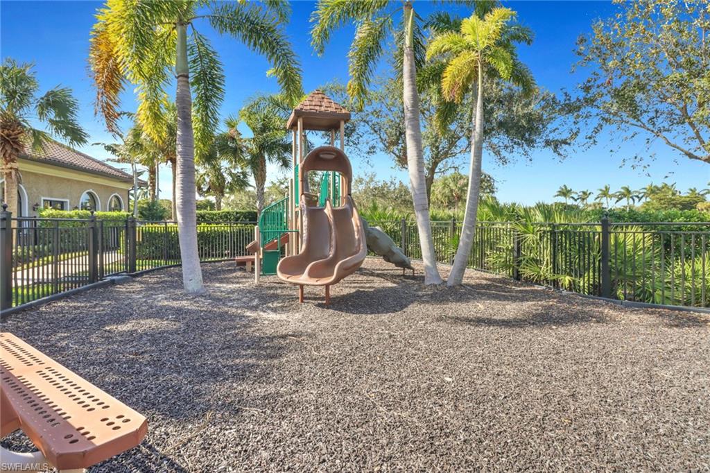 13527 San Georgio Drive Estero, FL 33928 - Photo 43 of 49 a view of a yard with a slide