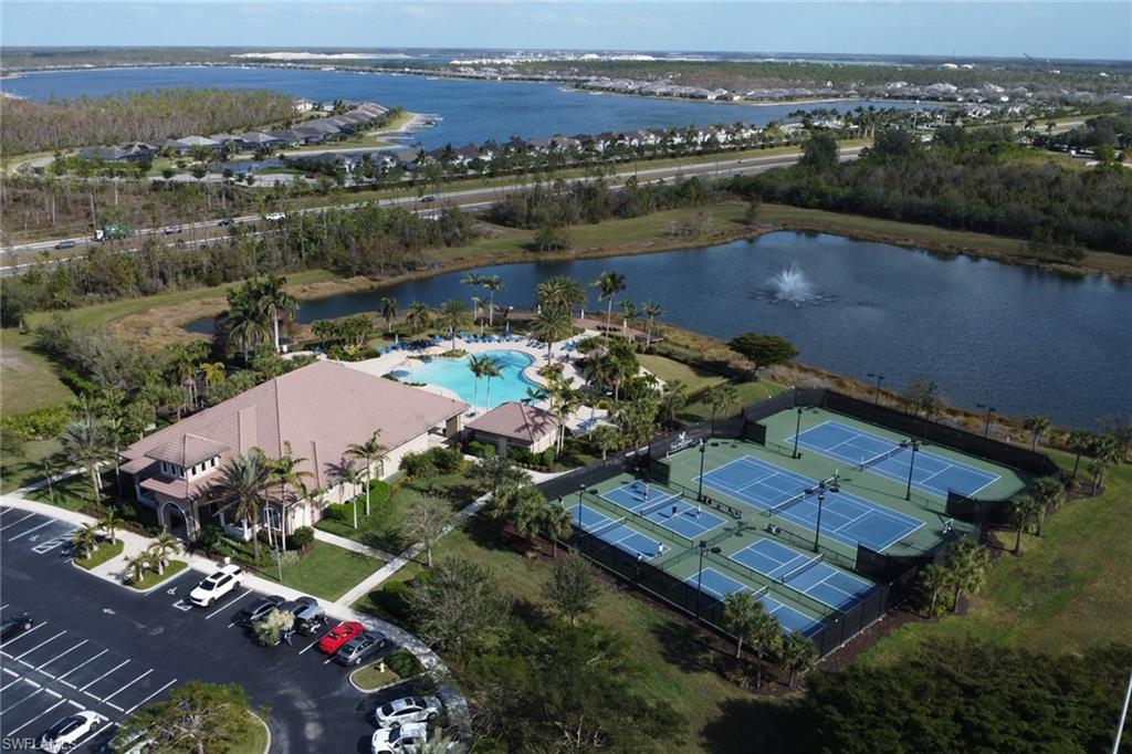 13527 San Georgio Drive Estero, FL 33928 - Photo 44 of 49 an aerial view of a house with a lake view