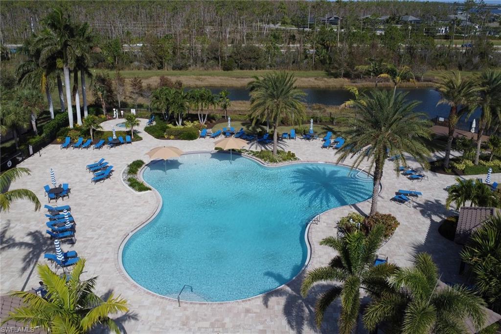 13527 San Georgio Drive Estero, FL 33928 - Photo 47 of 49 an aerial view of a house with outdoor space and swimming pool
