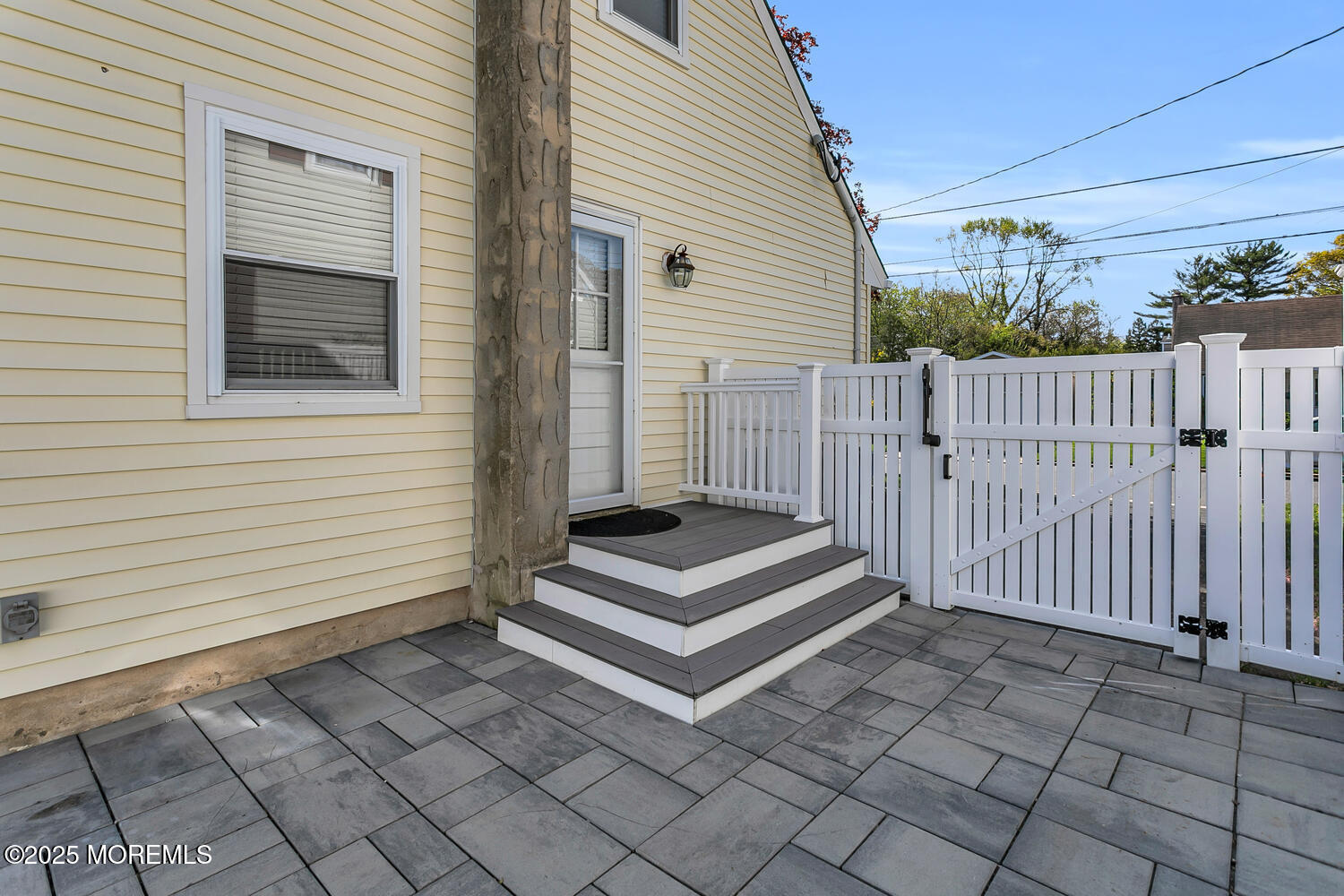 1214 Crosby Road Spring Lake Heights, NJ 07762 - Photo 27 of 32 a view of a white house with wooden fence