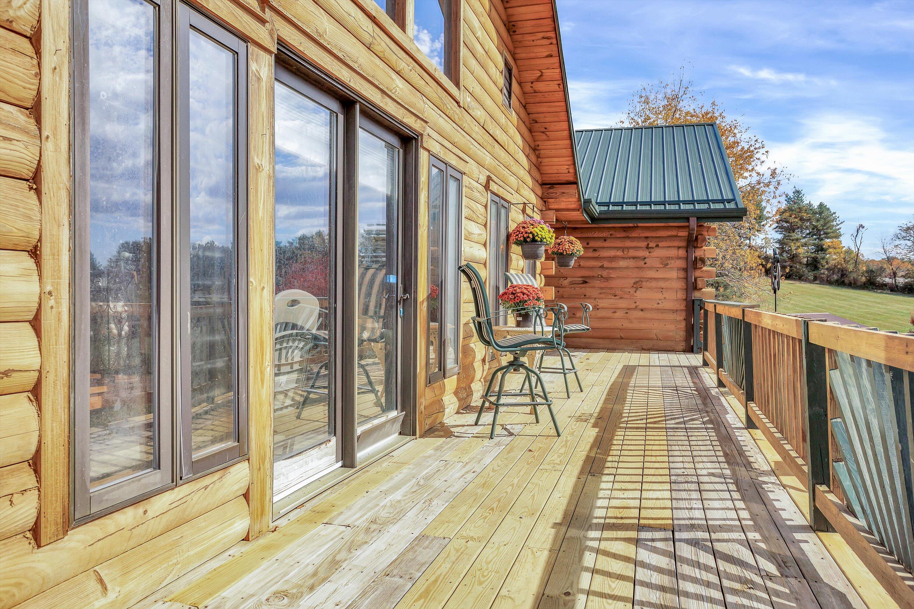 765 Algoma Road Callaway, VA 24067 - Photo 41 of 61 a view of a balcony with wooden floor and outdoor space