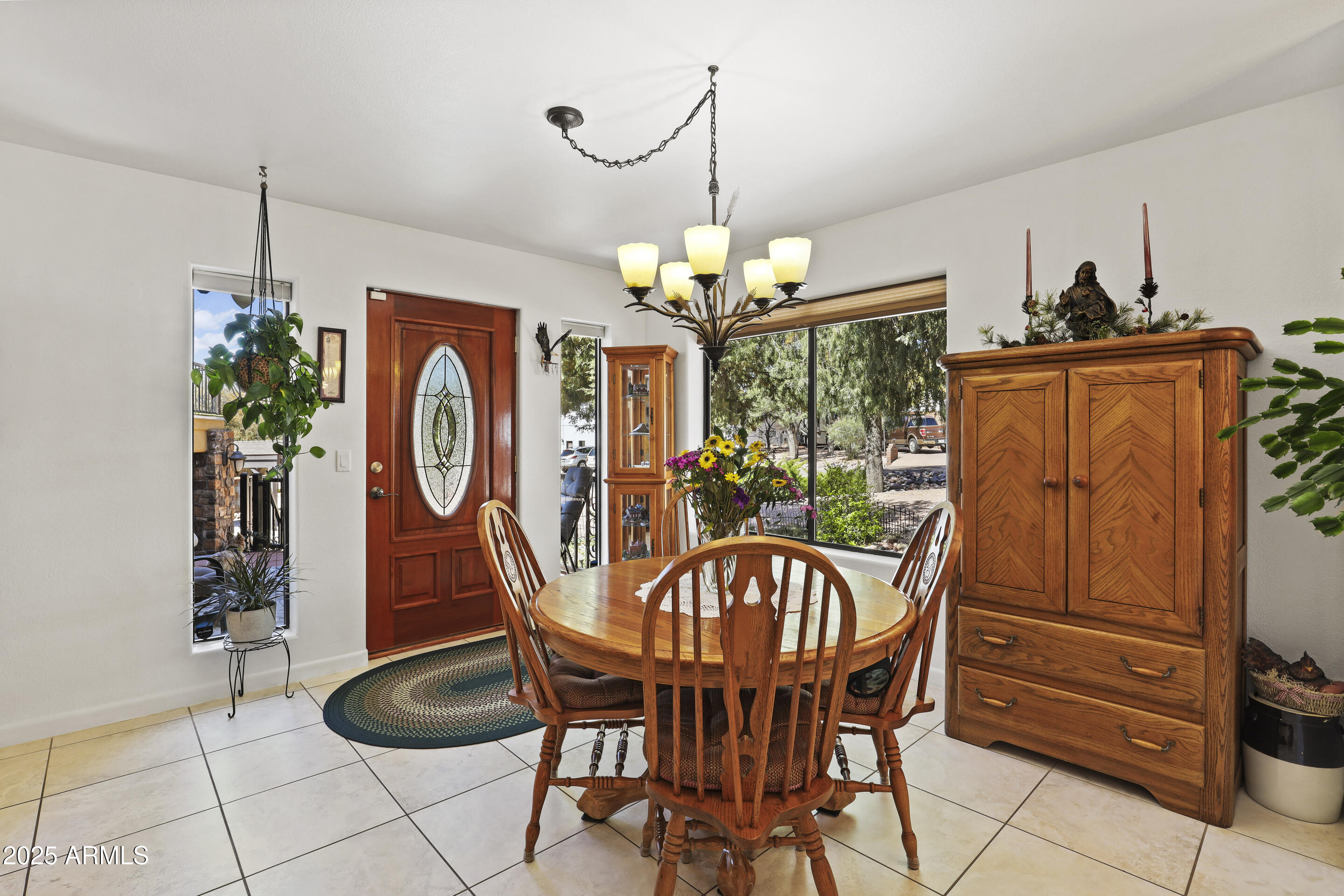 1418 North Sunset Drive Payson, AZ 85541 - Photo 11 of 48 a view of a dining room with furniture window and outside view