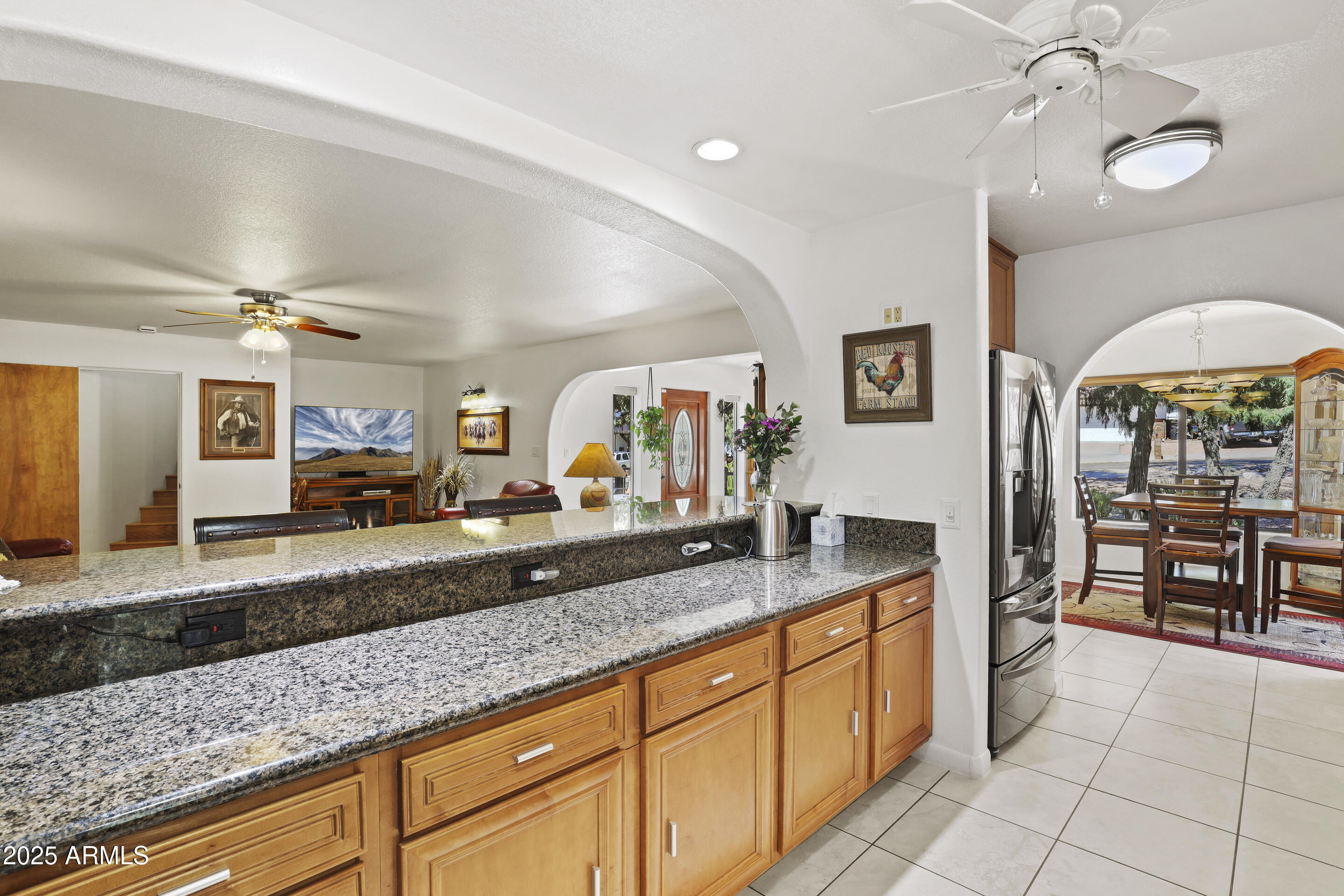 1418 North Sunset Drive Payson, AZ 85541 - Photo 13 of 48 a large kitchen with granite countertop a sink and a counter top space