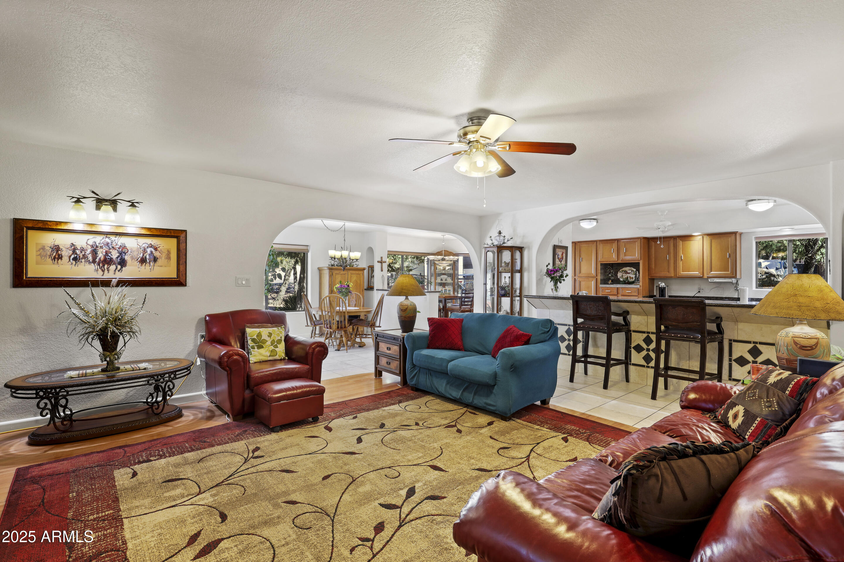 1418 North Sunset Drive Payson, AZ 85541 - Photo 14 of 48 a living room with furniture a ceiling fan and a rug