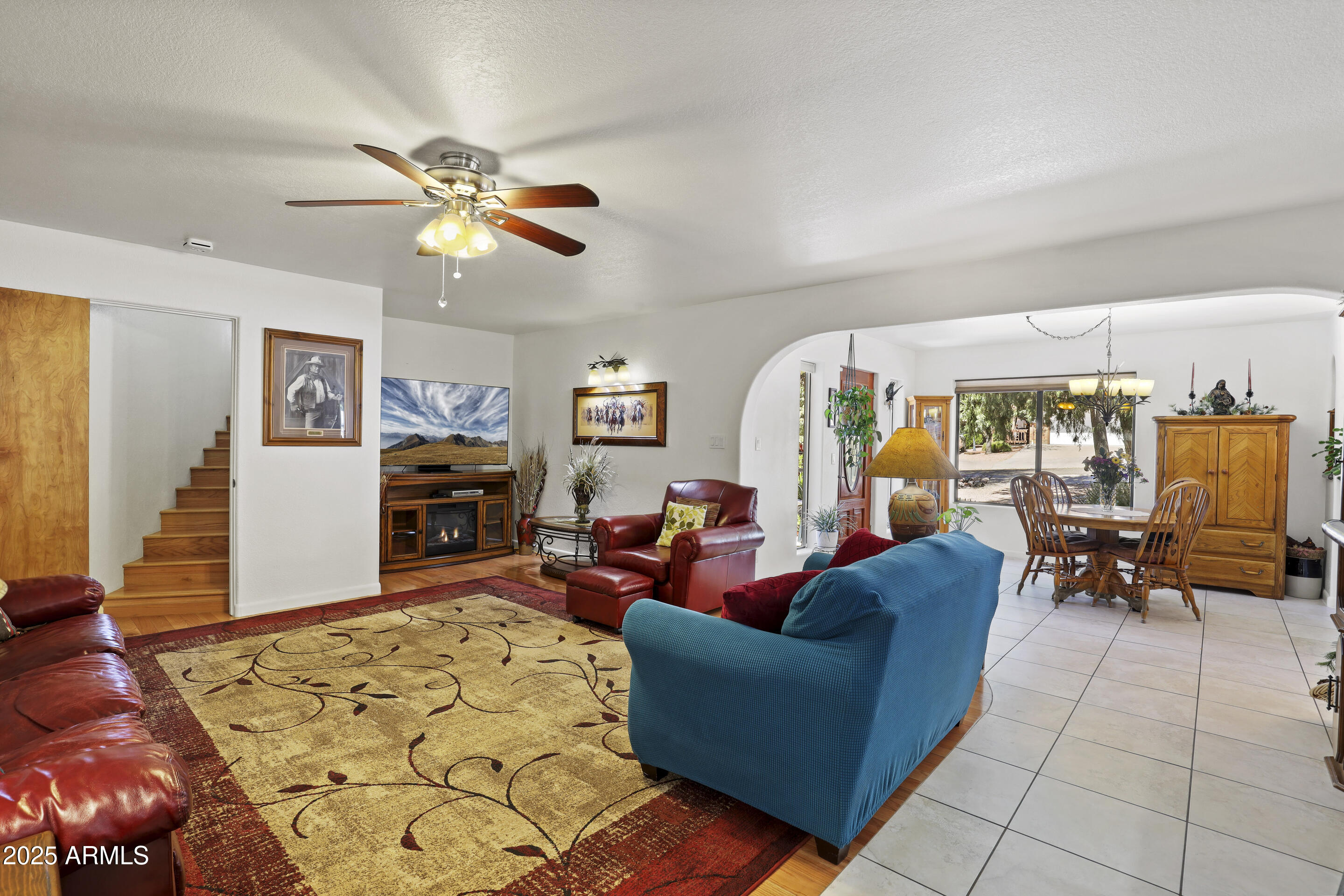 1418 North Sunset Drive Payson, AZ 85541 - Photo 16 of 48 a living room with furniture and wooden floor