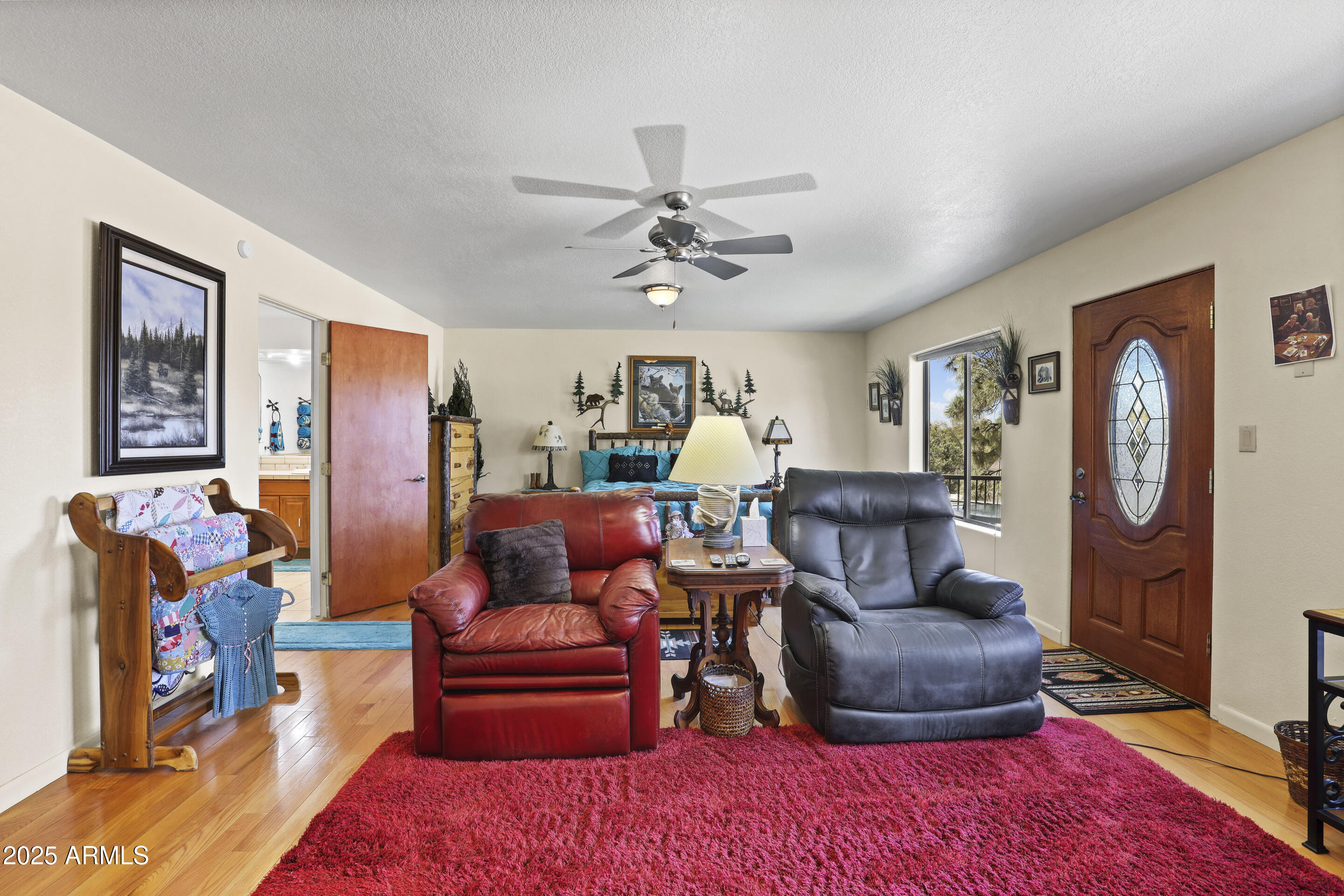 1418 North Sunset Drive Payson, AZ 85541 - Photo 20 of 48 a living room with furniture and wooden floor