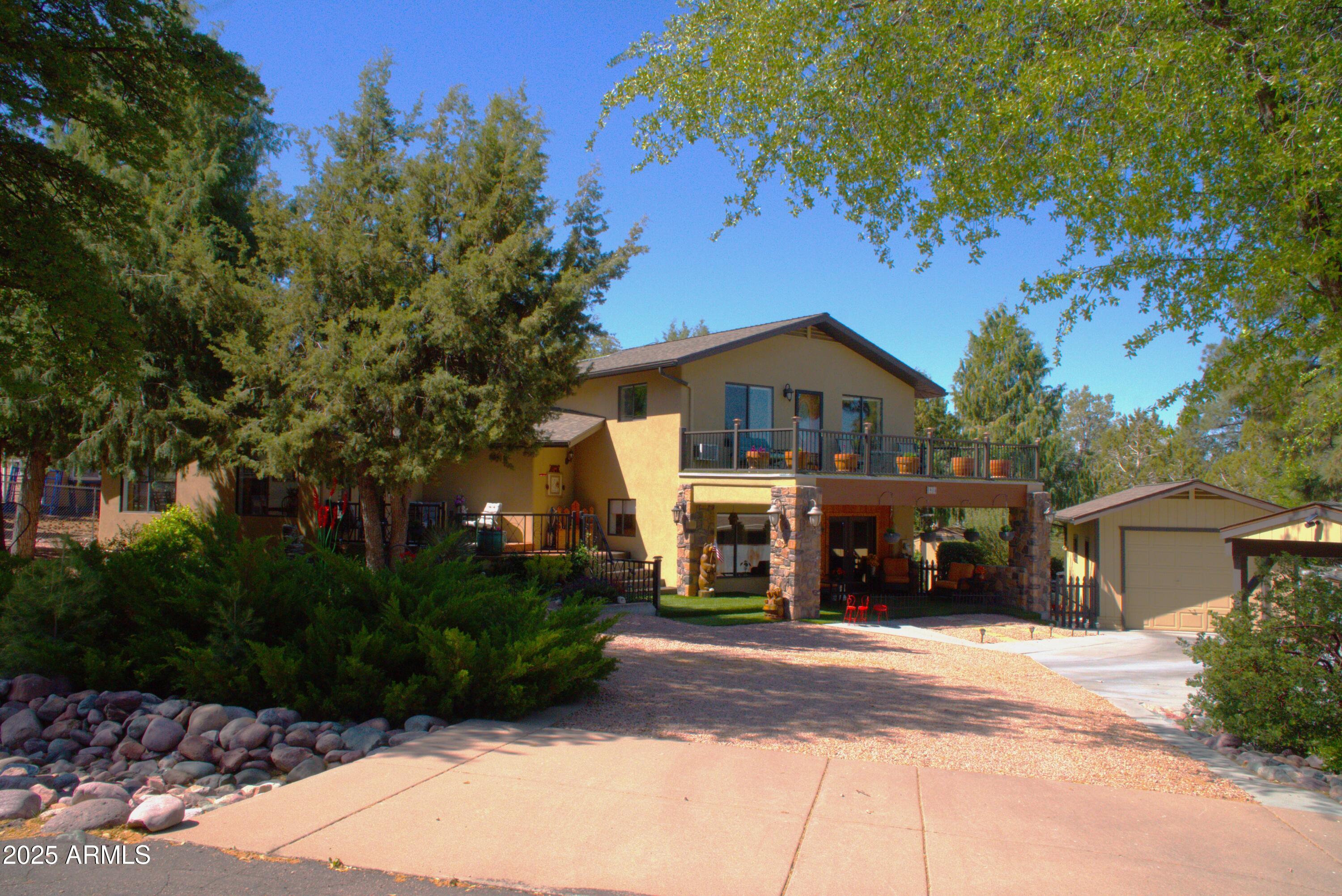 1418 North Sunset Drive Payson, AZ 85541 - Photo 2 of 48 a view of house with outdoor space and trees