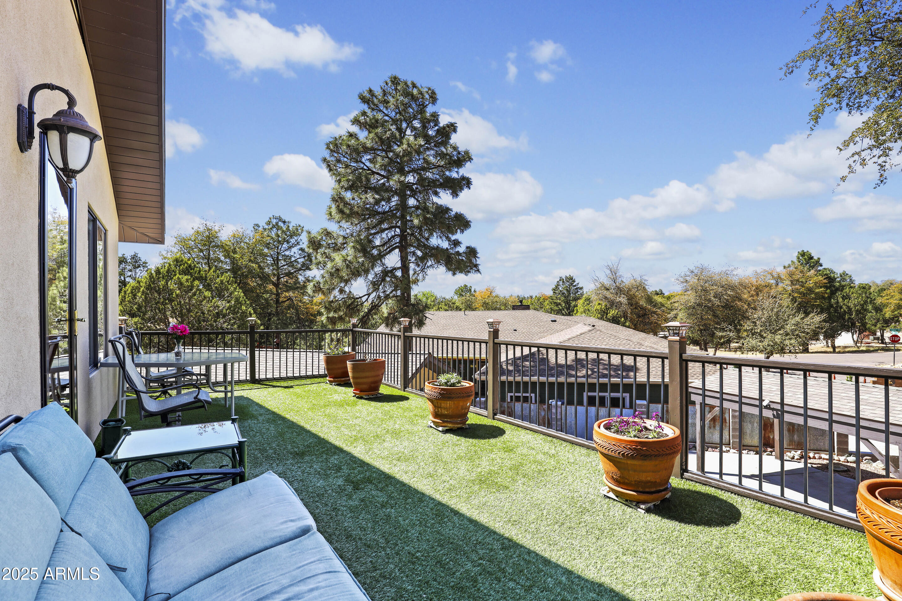 1418 North Sunset Drive Payson, AZ 85541 - Photo 25 of 48 a view of a chair and tables back yard of the house