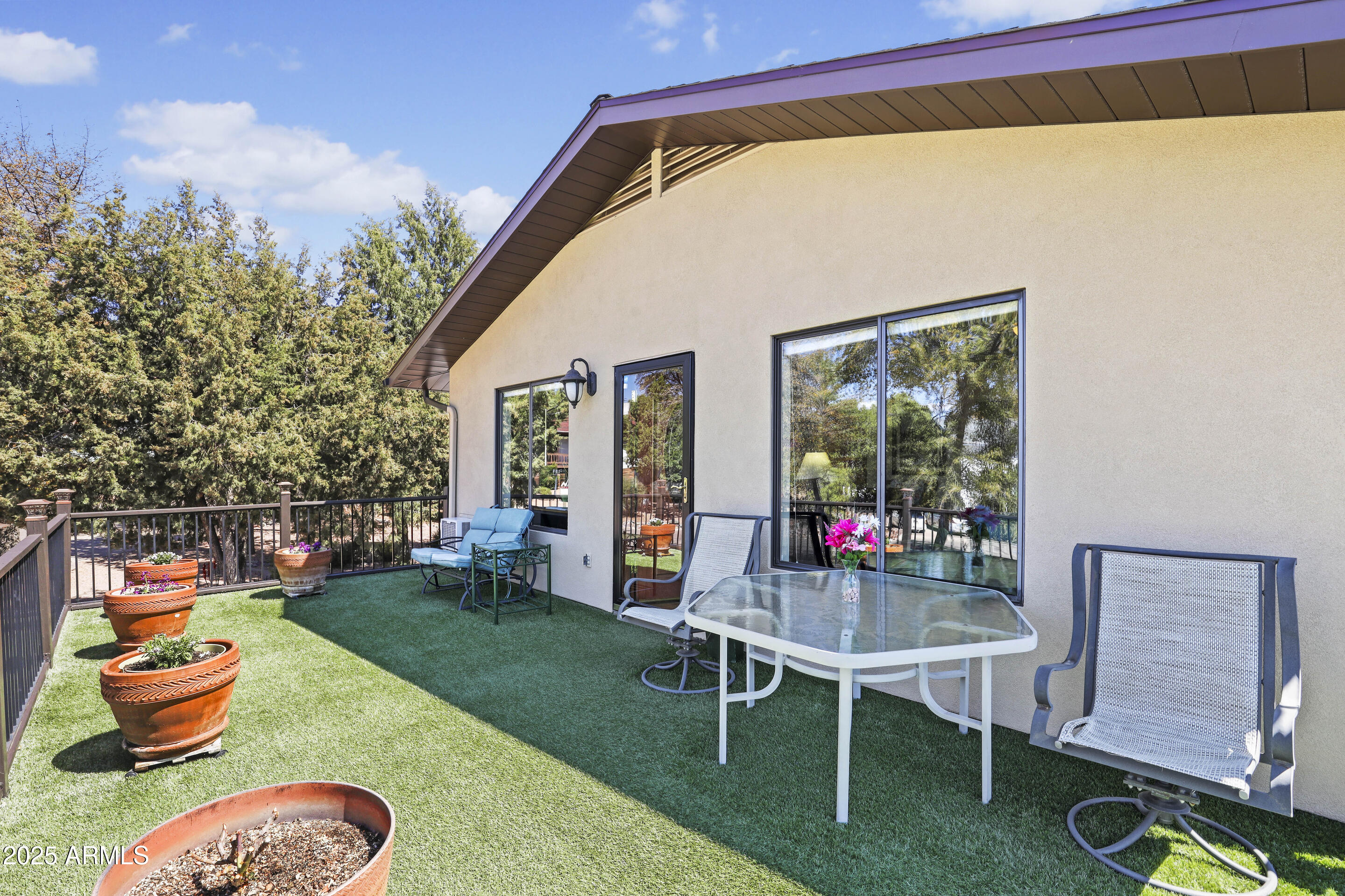 1418 North Sunset Drive Payson, AZ 85541 - Photo 26 of 48 a backyard of a house with outdoor seating
