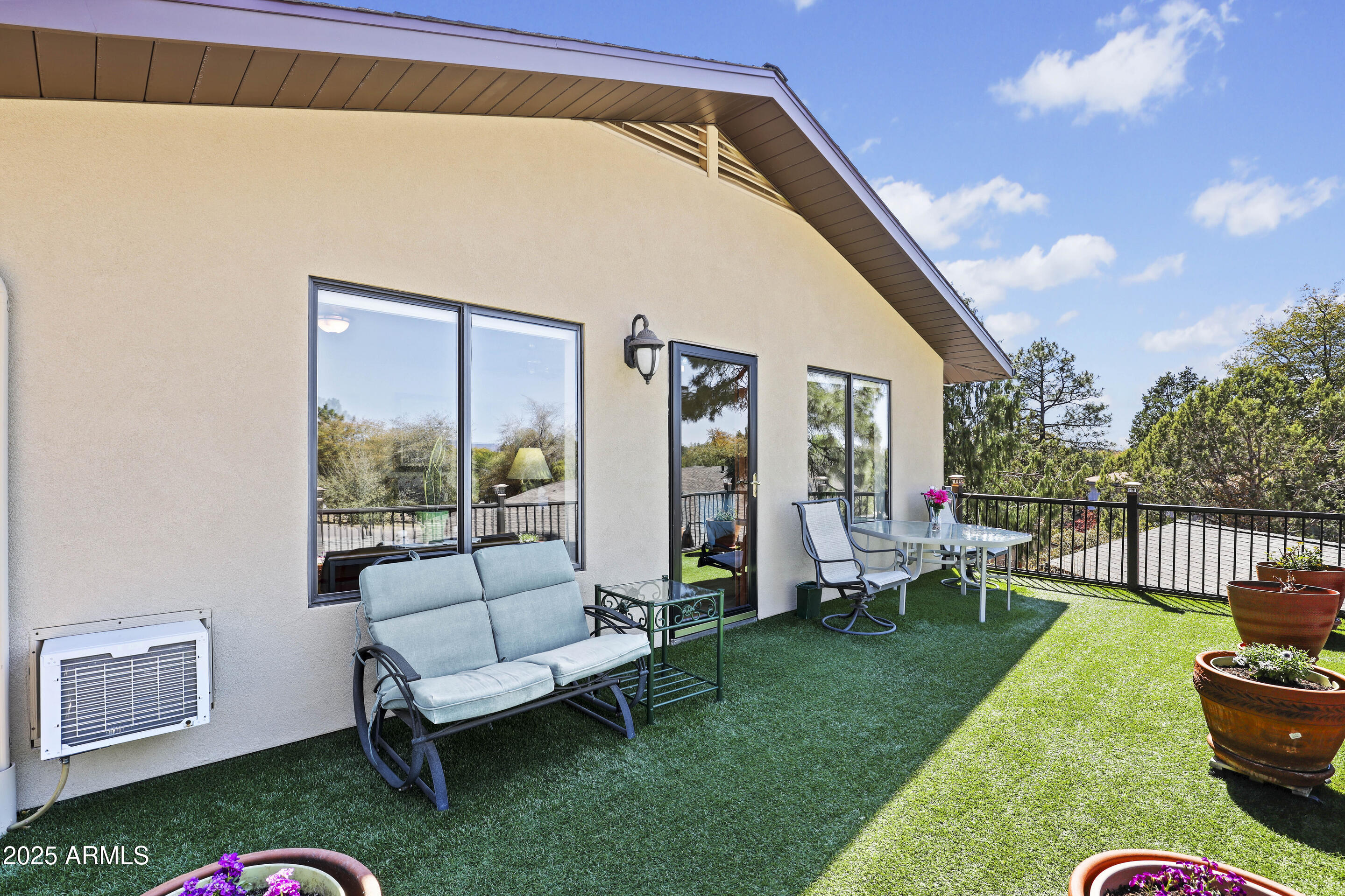 1418 North Sunset Drive Payson, AZ 85541 - Photo 27 of 48 a backyard of a house with table and chairs
