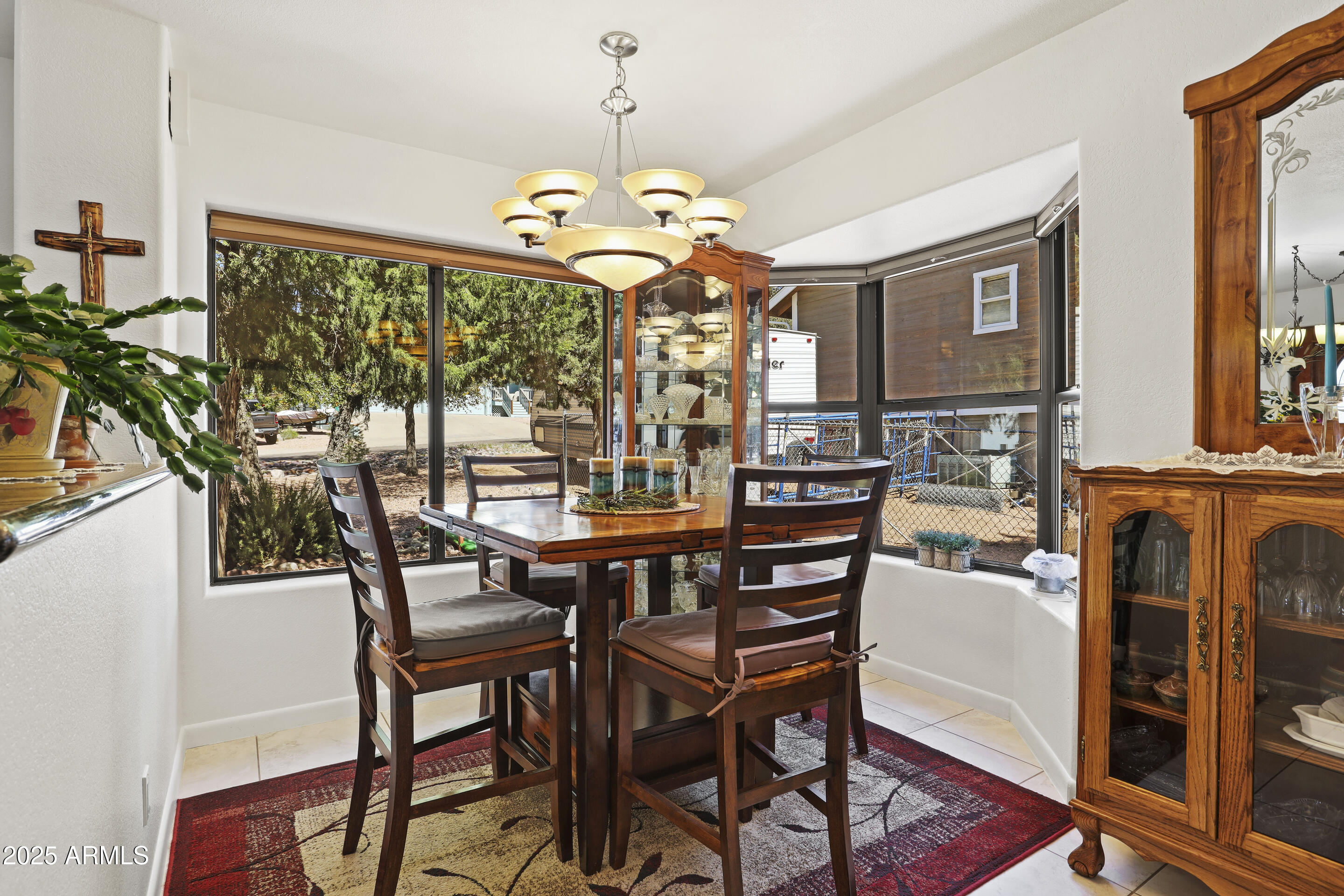 1418 North Sunset Drive Payson, AZ 85541 - Photo 10 of 48 a view of a dining room with furniture window and wooden floor