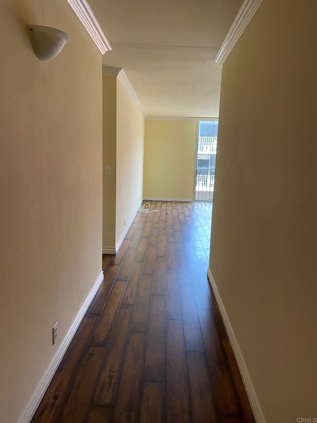 7811 Eads Avenue, Unit 307 La Jolla, CA 92037 - Photo 2 of 17 a view of a hallway with wooden floor