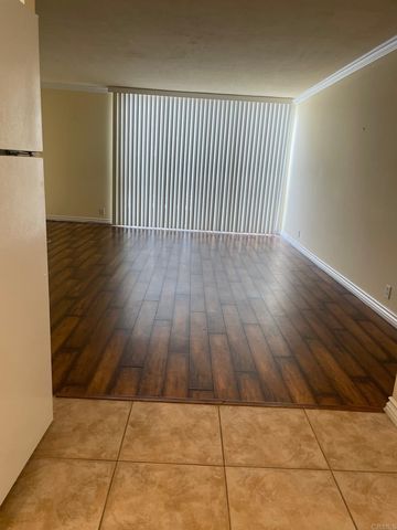 a view of wooden floor in an empty room