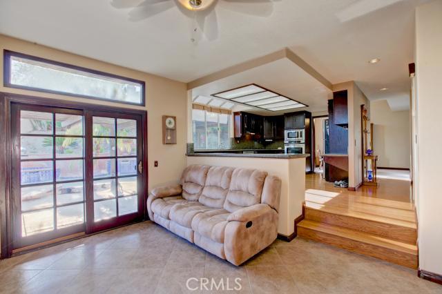 2700 Amber Circle Corona, CA 92882 - Photo 13 of 35 a living room with furniture and a large window