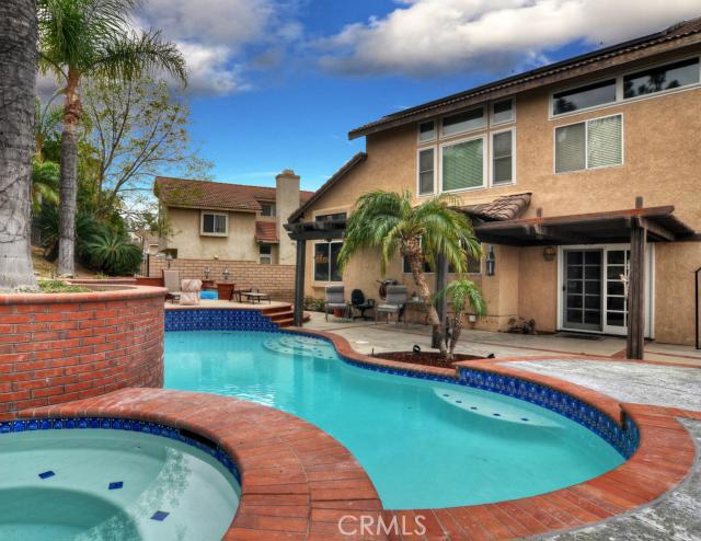 2700 Amber Circle Corona, CA 92882 - Photo 15 of 35 a view of a house with swimming pool and sitting area