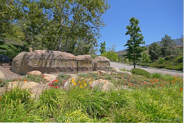 2700 Amber Circle Corona, CA 92882 - Photo 29 of 35 a backyard of a house with lots of green space