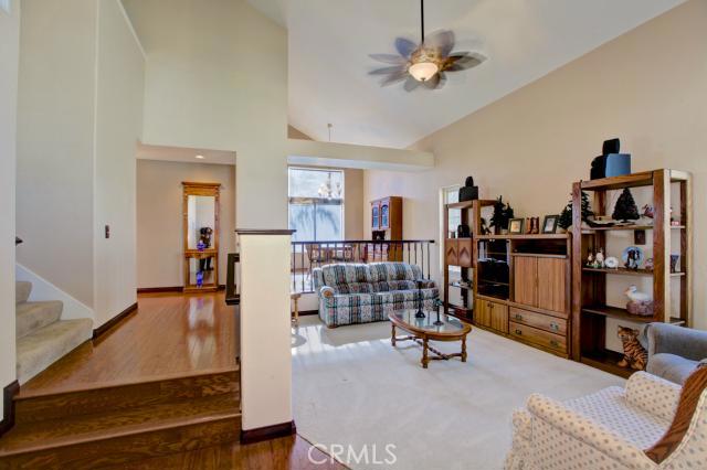 2700 Amber Circle Corona, CA 92882 - Photo 5 of 35 a living room with lots of furniture and a chandelier