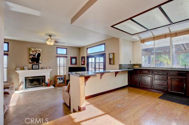 2700 Amber Circle Corona, CA 92882 - Photo 8 of 35 a living room with furniture and a fireplace