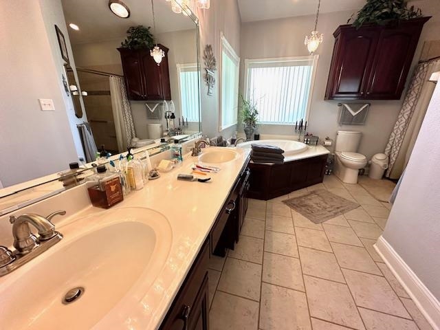3123 Jeter Road Clifton, TN 38425 - Photo 16 of 40 a bathroom with a tub sink and mirror