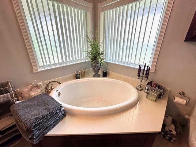 3123 Jeter Road Clifton, TN 38425 - Photo 17 of 40 a bathroom with a sink and a mirror