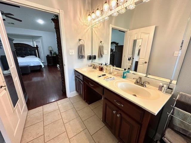 3123 Jeter Road Clifton, TN 38425 - Photo 19 of 40 a en suite bathroom with a sink double vanity and a mirror