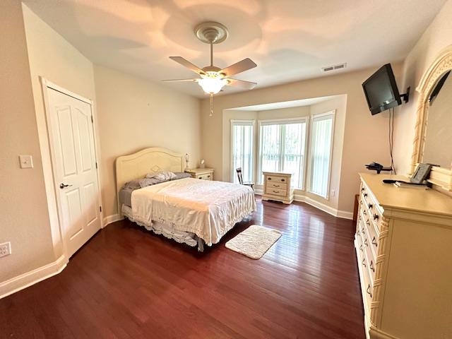 3123 Jeter Road Clifton, TN 38425 - Photo 20 of 40 a spacious bedroom with a bed and wooden floor