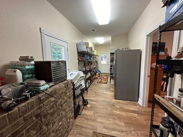 3123 Jeter Road Clifton, TN 38425 - Photo 28 of 40 a view of a room with workspace and wooden floor