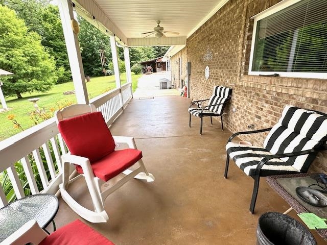 3123 Jeter Road Clifton, TN 38425 - Photo 33 of 40 a building outdoor space with seating area
