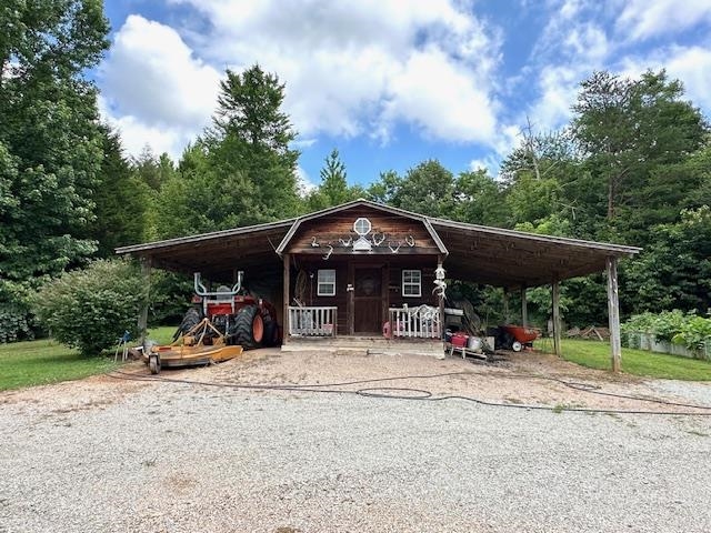 3123 Jeter Road Clifton, TN 38425 - Photo 35 of 40 a view of outdoor space with deck and garden