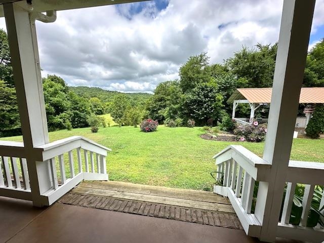 3123 Jeter Road Clifton, TN 38425 - Photo 4 of 40 a view of a porch with garden