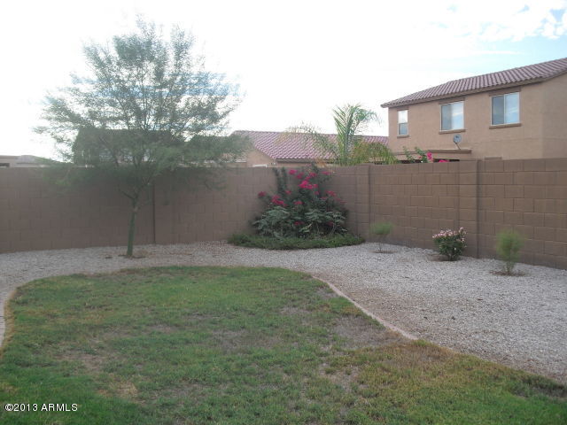 7016 West Carter Road Laveen, AZ 85339 - Photo 2 of 5 7016 Carter back yard
