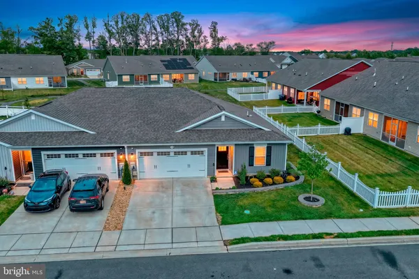 an aerial view of a house with a garden